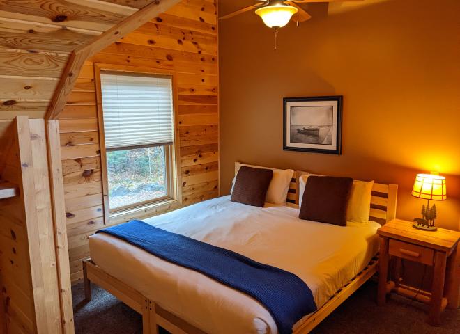 Upstairs bedroom with a king bed.