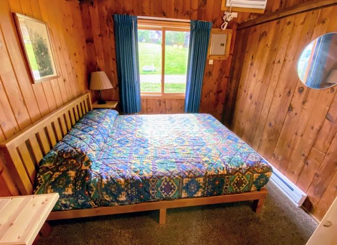 Bedroom with a queen bed.