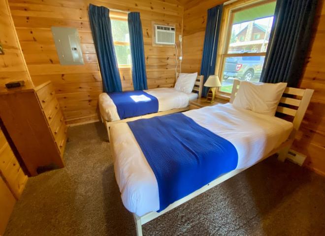 Bedroom with two XL twin bed.