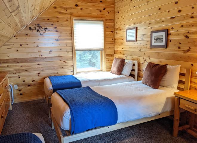 Upstairs bedroom with two XL twins and a regular twin.