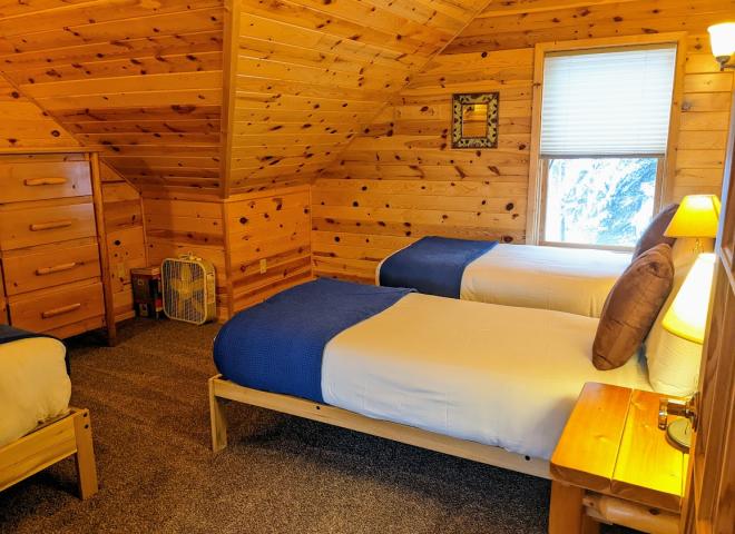 Upstairs bedroom with two XL twins and one regular twin.