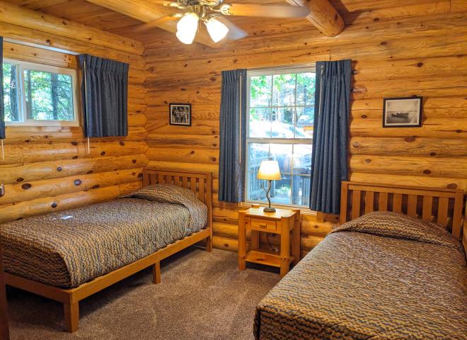 Main floor bedroom with two twin beds.