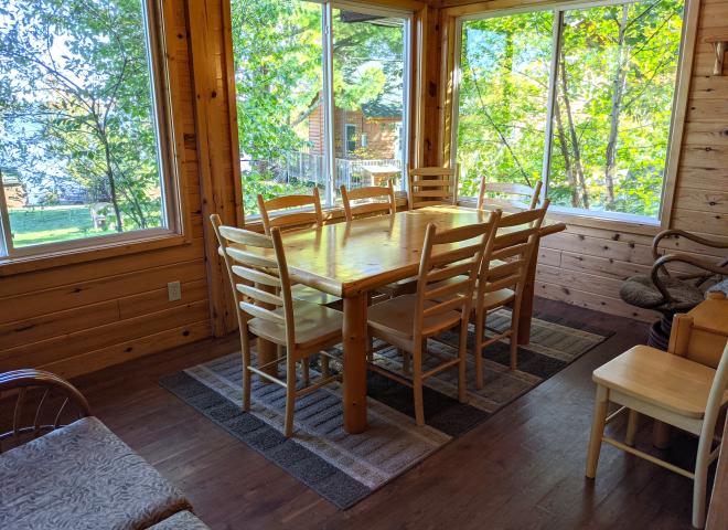 Dining room with extra seating and views of the lake.