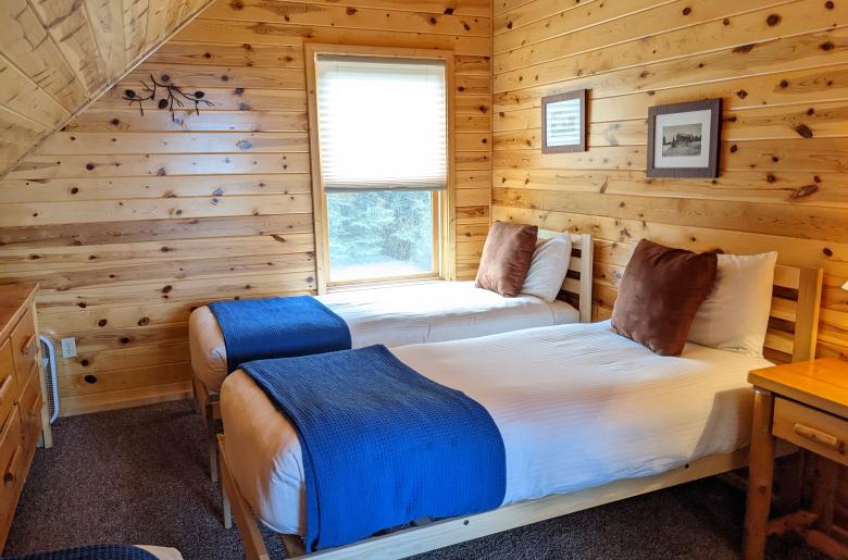 Upstairs bedroom with two XL twins and a regular twin.