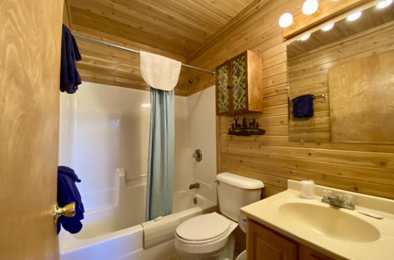 Master bathroom with a standard tub/shower.