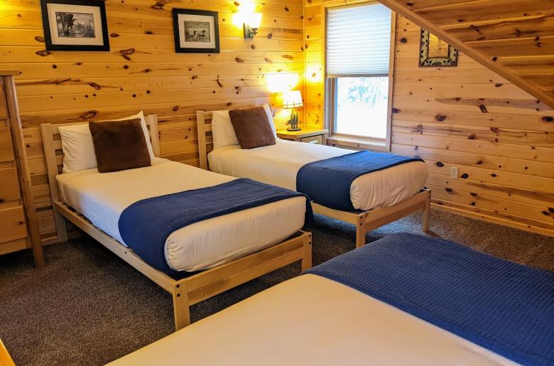 Upstairs bedroom with two XL twins and one regular twin.