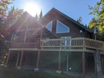 Exterior of Spinnaker with the sun rising.