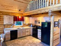 Kitchen with a refrigerator, stove, and dishwasher.
