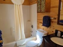 Master bathroom with a standard tub/shower.