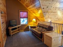 Loft area with a futon.